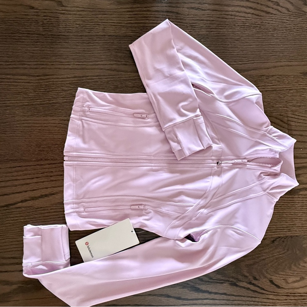 NWT Lululemon Define, cropped baby pink jacket. Size 6.
